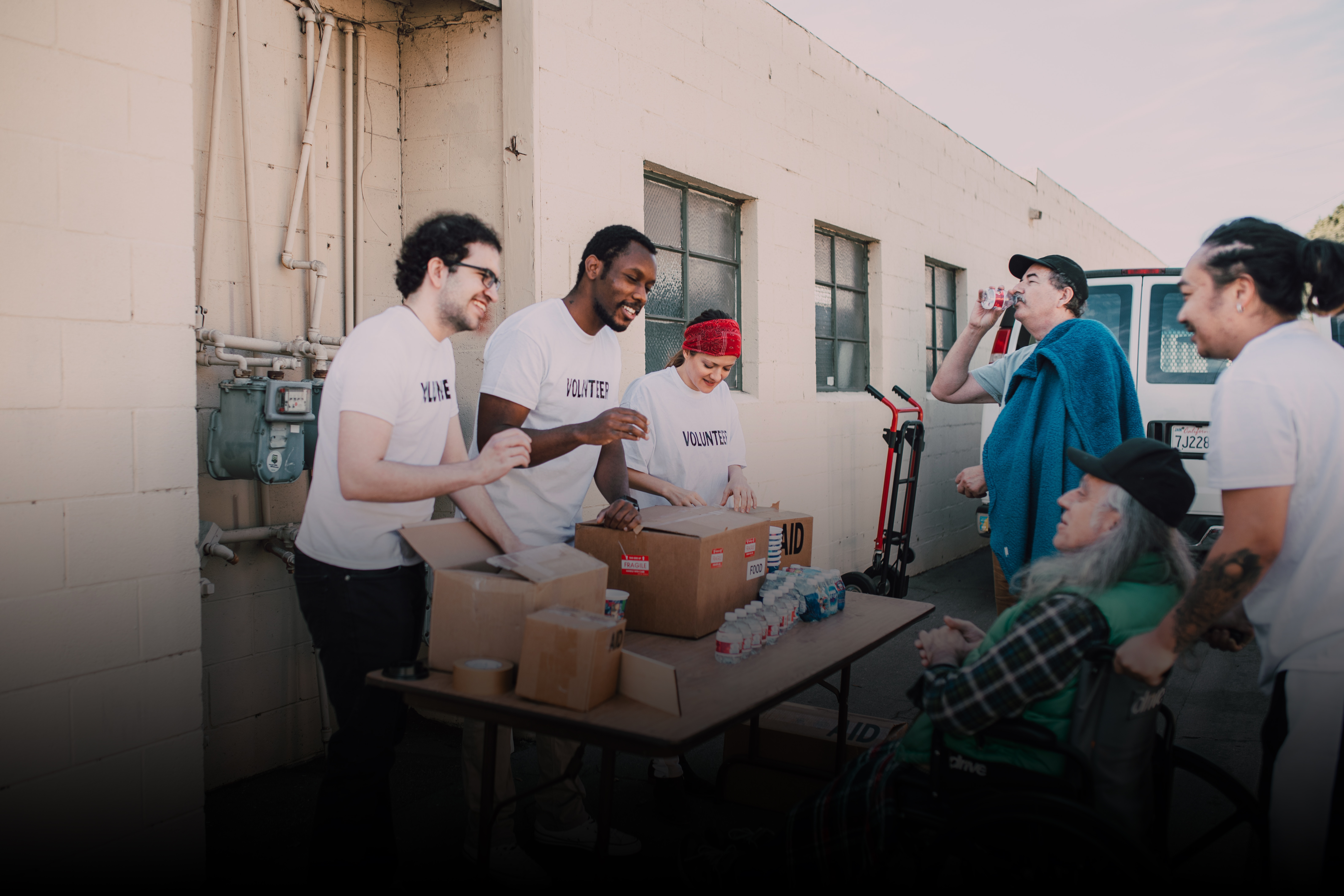 Volunteers sharing water & food